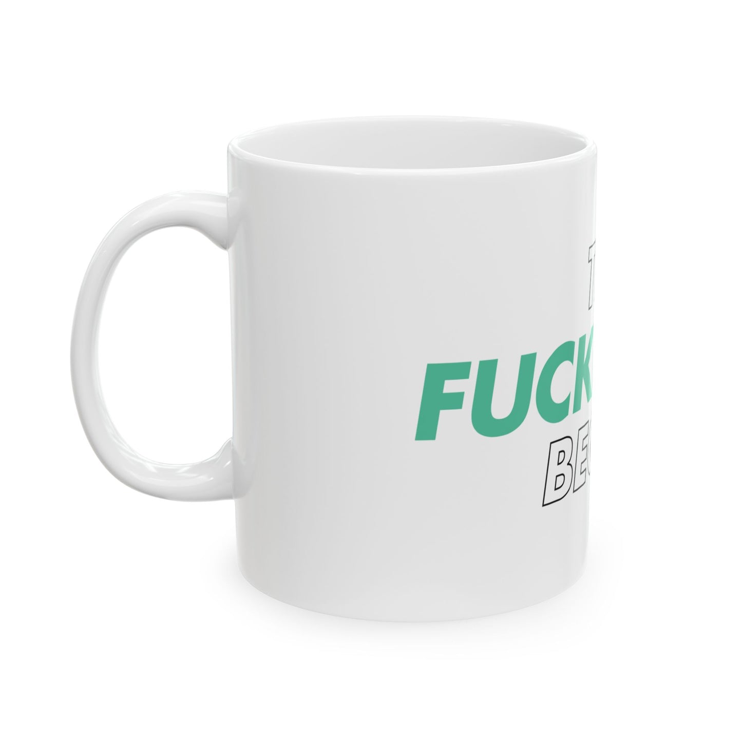 White mug with green text on a white background