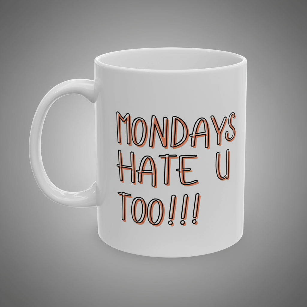 White mug with 'MONDAYS HATE U TOO!!!' text in brown on a white background