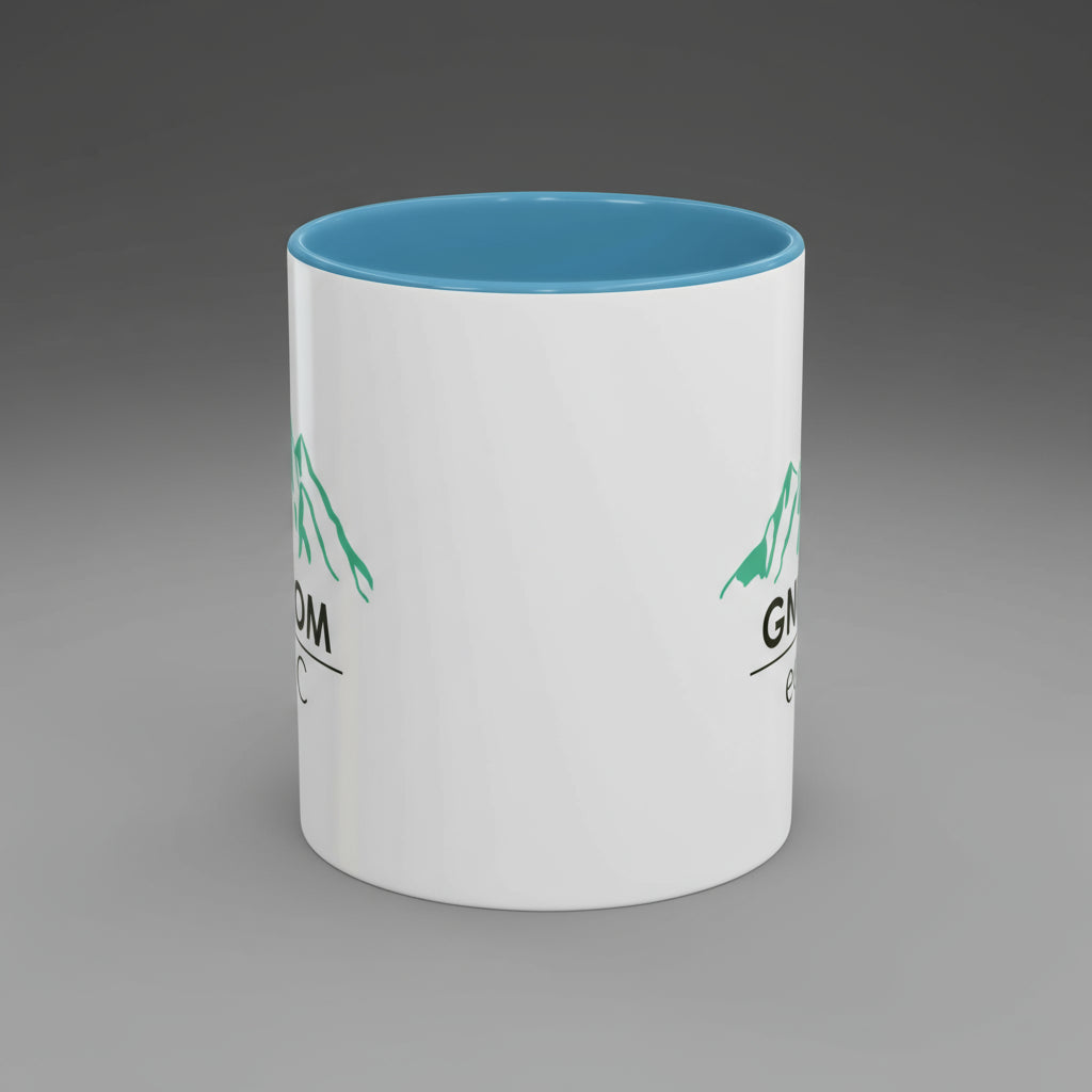 White mug with blue interior and green text on a white background