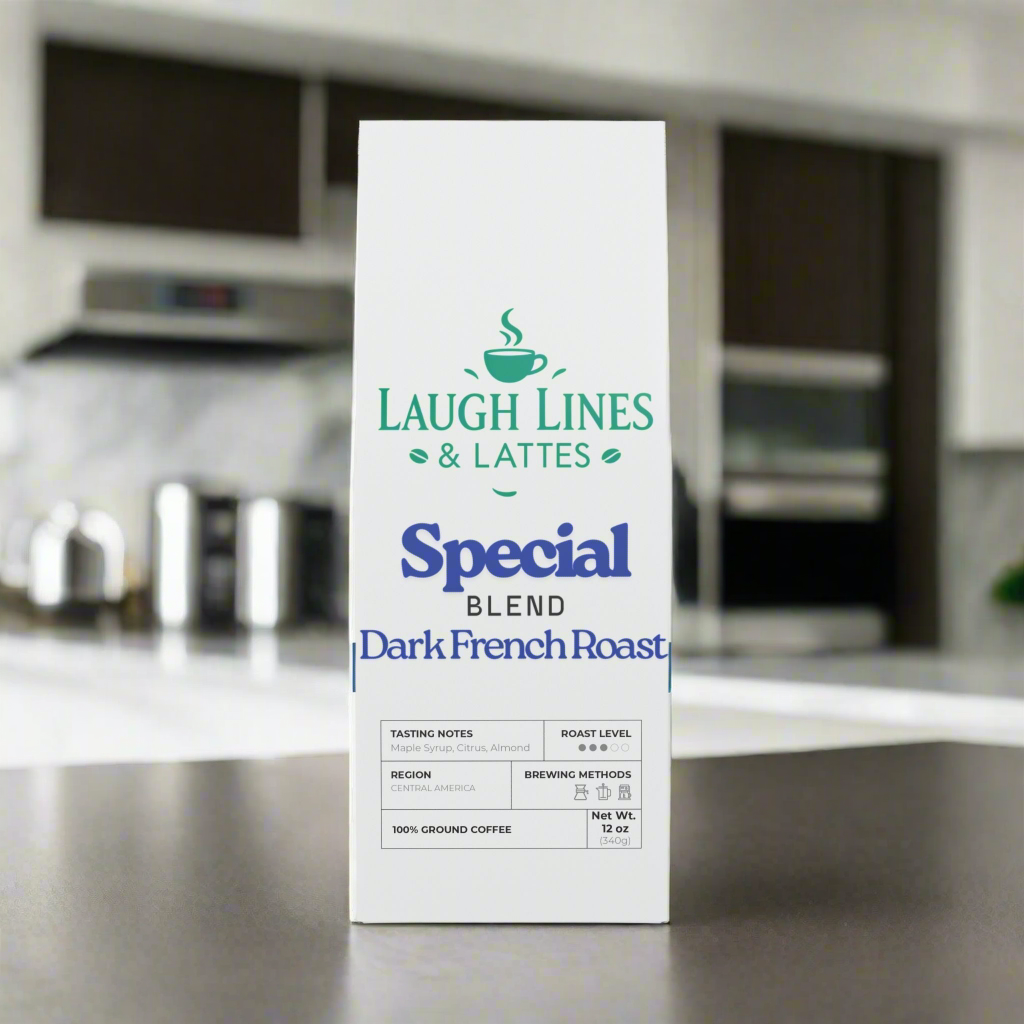 Box of Laugh Lines & Lattes Special Blend Dark French Roast coffee on a kitchen counter.