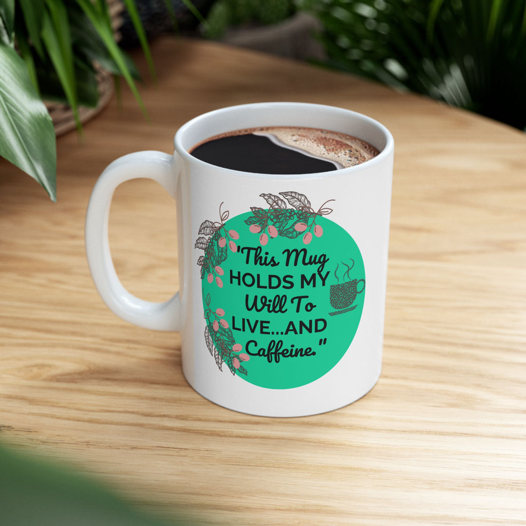White mug with a green design and text on a wooden surface