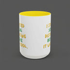 White mug with yellow interior and text on a white background