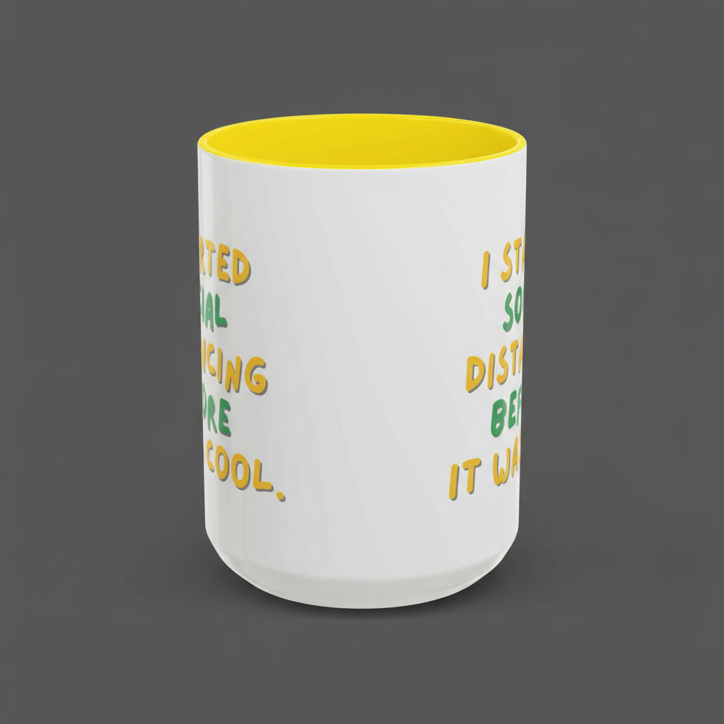 White mug with yellow interior and text on a white background