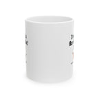 White mug with text and a small graphic on a white background