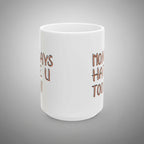 White mug with copper text on a white background