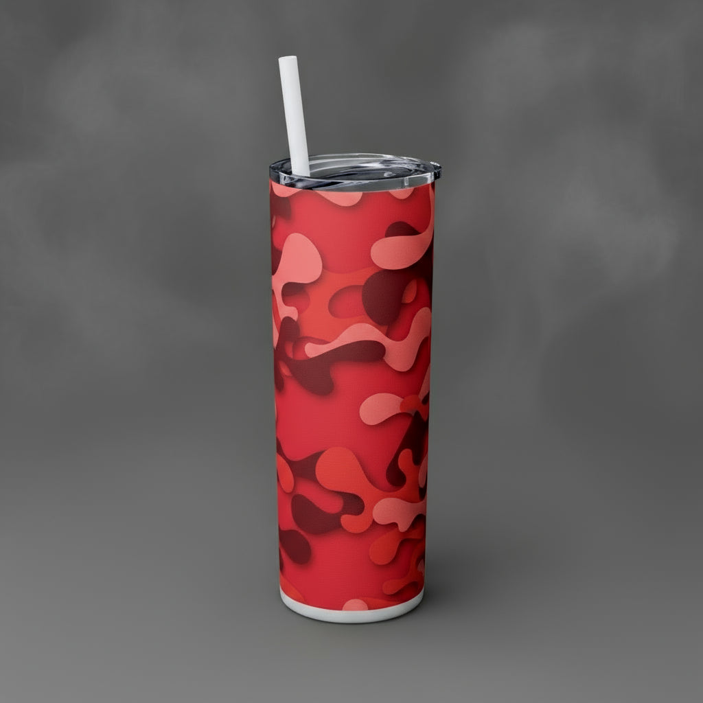 Red camouflage-patterned tumbler with a straw on a white background