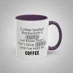 White mug with purple interior and handle featuring humorous coffee-themed text on a gray background