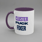 White mug with purple interior and handle, featuring text 'CLUSTER FUCK FIXER' in purple and black.