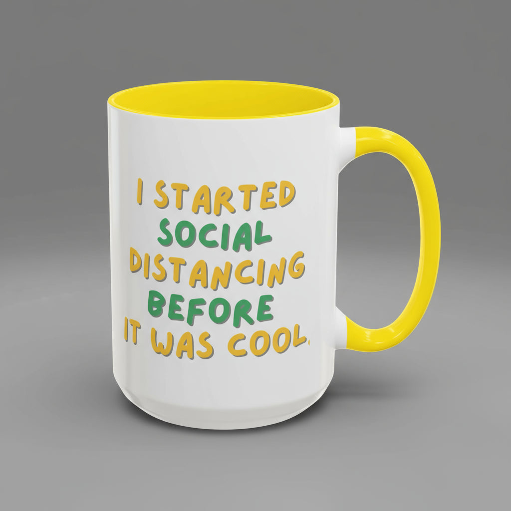 Mug with yellow interior and handle, featuring a humorous quote.