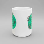 White mug with green floral design and text on a white background