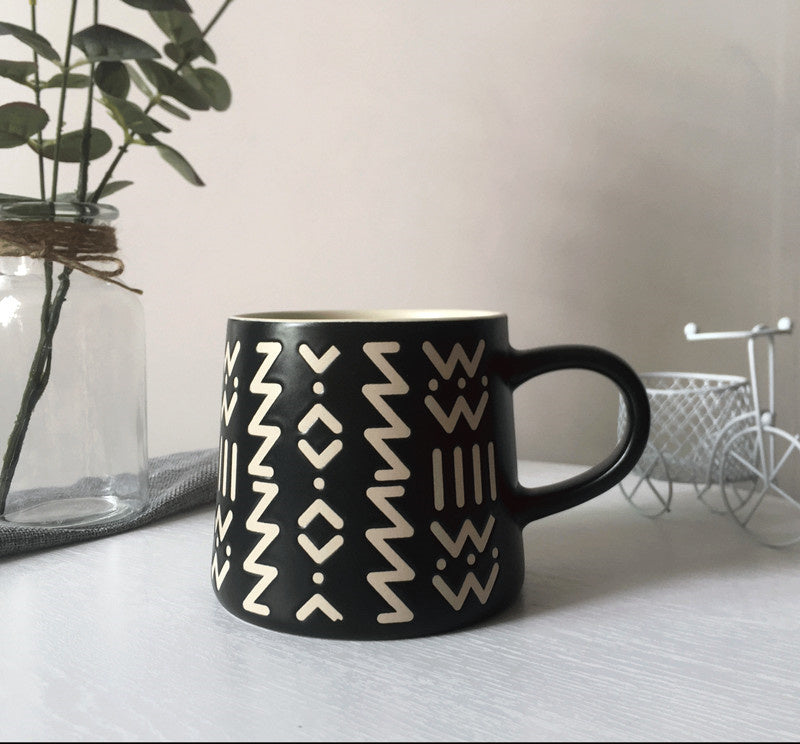 Black Ceramic Mug with artistic designs, coffee cup for coffee enthusiasts 
