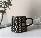 Black Ceramic Mug with artistic designs, coffee cup for coffee enthusiasts 