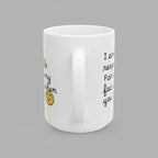 White mug with text and emoji design on a white background