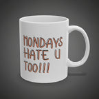 White mug with text 'MONDAYS HATE U TOO!!!' in brown on a white background