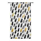 Curtain with black and gold abstract pattern on a white background