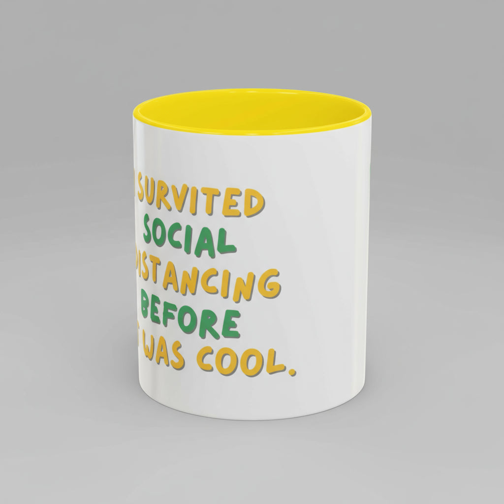 White mug with yellow interior and text on a white background