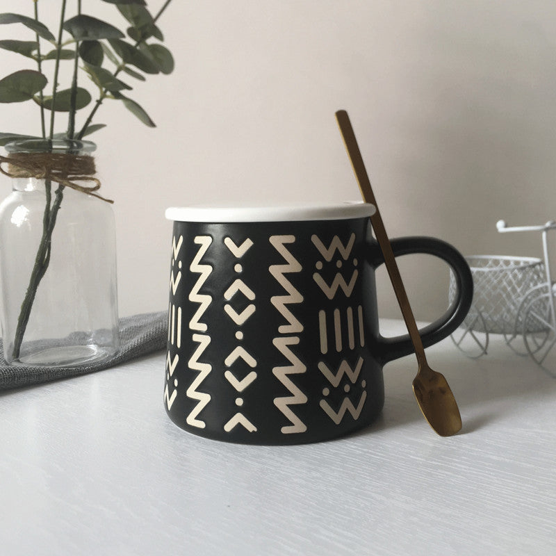 Coffee Mugs for any occasion, black ceramic mug with designs and spoon 
