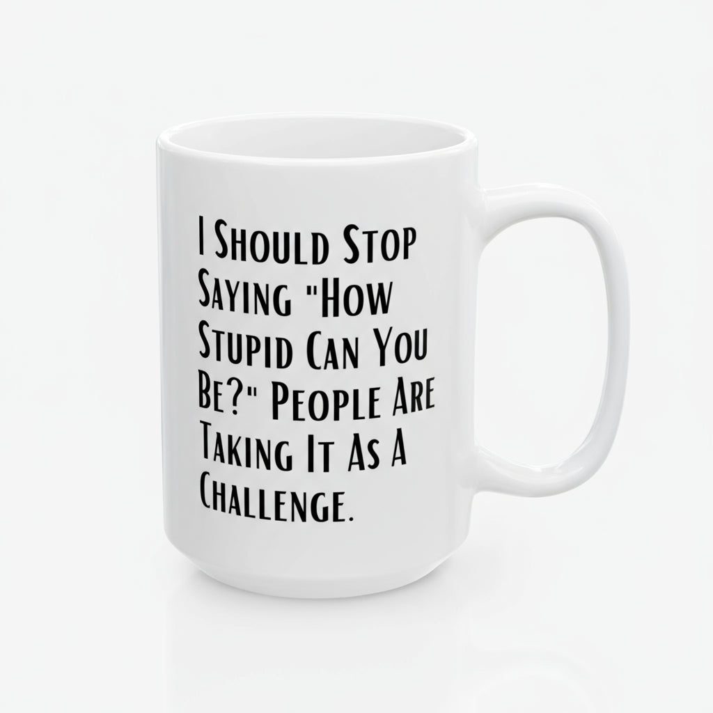 White mug with black text on a white background