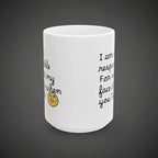 White mug with text and a yellow emoji on a white background