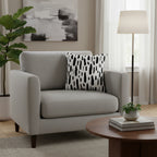 Decorative pillow with black abstract pattern on a white background