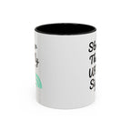 White mug with black interior and text on a white background