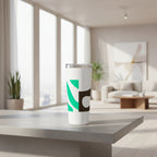 White tumbler with green and brown abstract design on a white background