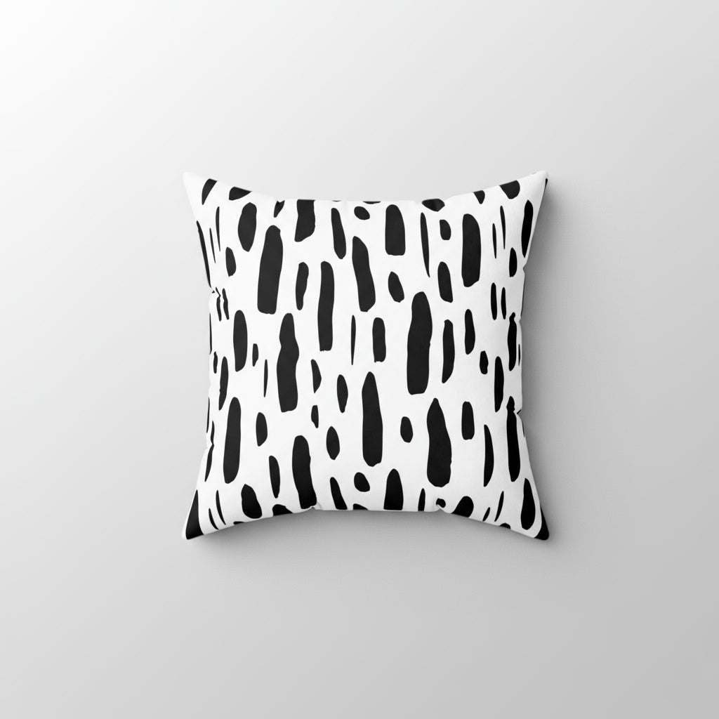 Decorative pillow with black abstract pattern on a white background