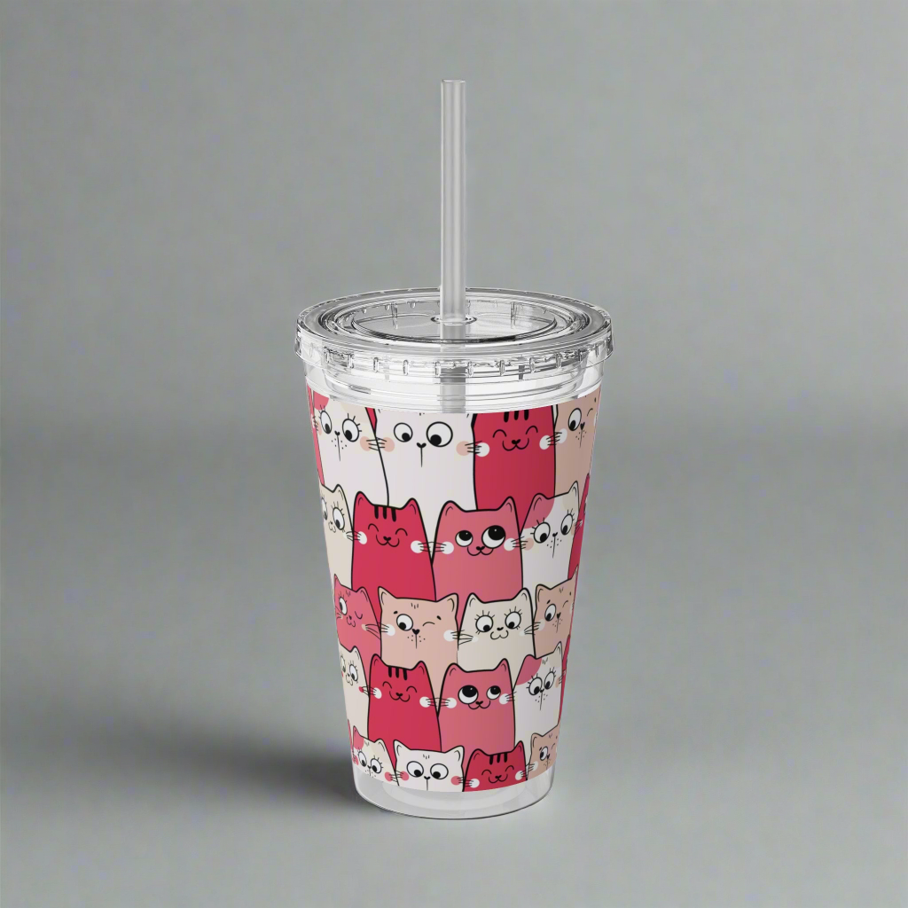 Tumbler with a straw and a cat pattern