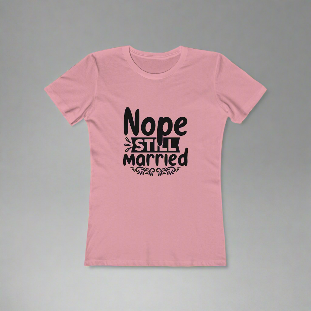 Pink t-shirt with 'Nope Still Married' text on a gray background